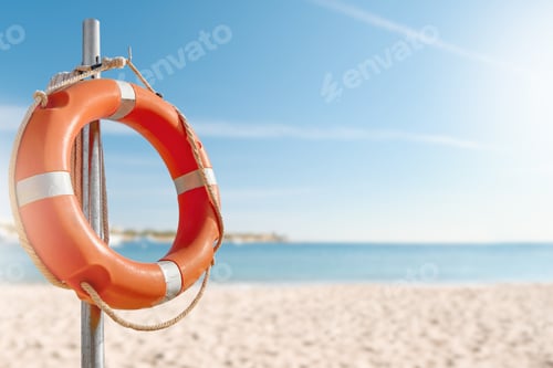 Preview: Lifebuoy circle. Scenic view of red and white lifebuoy on post on seaside beach. Scenery landscape o