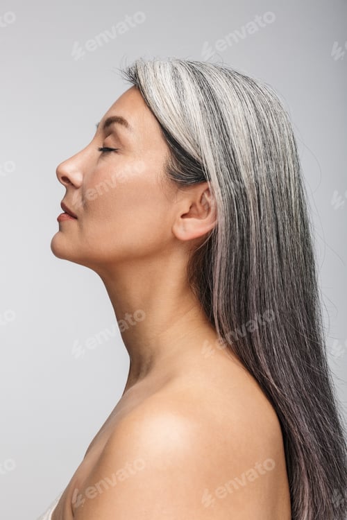Preview: Beauty portrait of an attractive mature topless woman