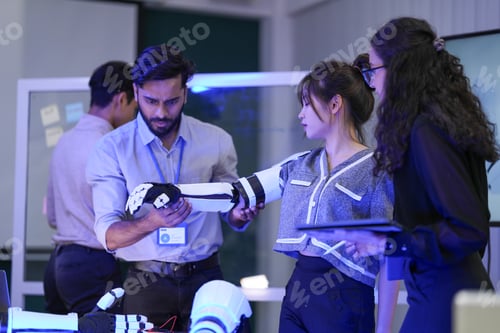 Preview: A robotics team develops a new bionic limb, inspecting the prototype