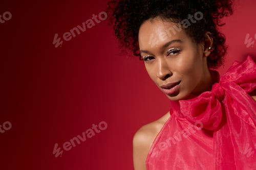 Preview: Beauty in vibrant red A stunning portrait of elegance and joy