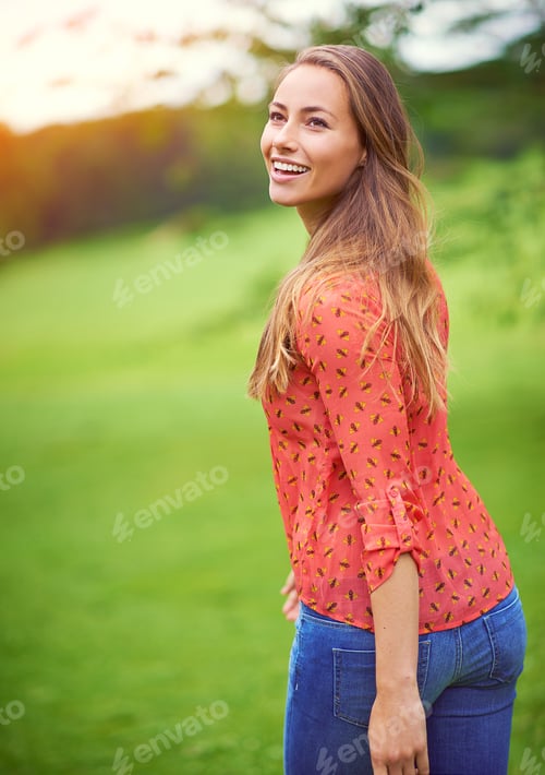 Preview: She loves coming to the park. Shot of a young woman enjoying a day in the outdoors.