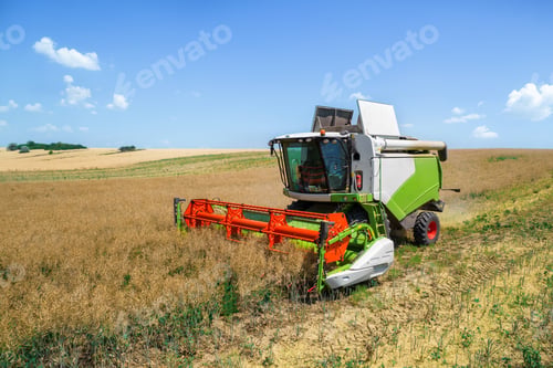 Preview: Aerial drone view of the harvester gathering crops