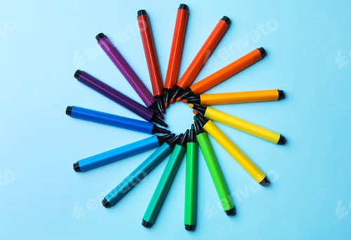 Preview: Flat lay composition with markers on color background. Rainbow palette