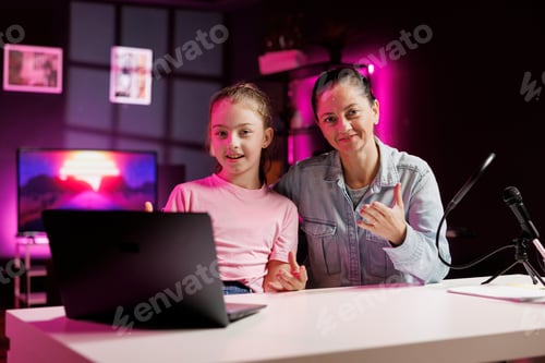 Preview: Child content creator and her parent watching funny internet clips on family channel