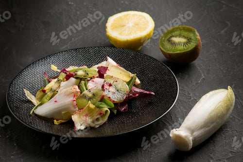Preview: mixed salad with kiwi lettuce beet chicory and lemon juice