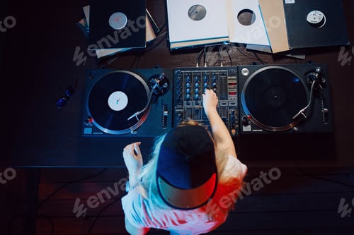 Preview: Cute dj woman having fun playing music at club party