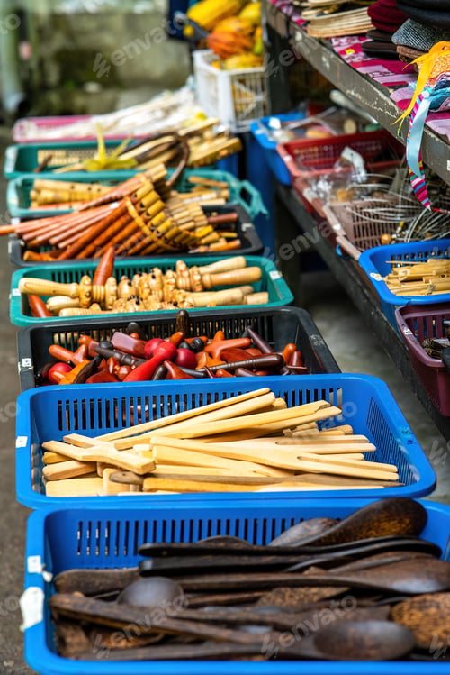 Preview: Wooden kitchen utensils in the basket for sale at the market in Malaysia.