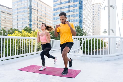 Preview: Multiethnic sportive couple training outdoor
