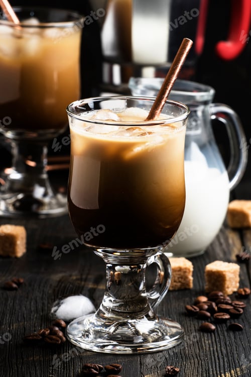 Preview: Iced coffee in glass, milk, sugar and coffee maker