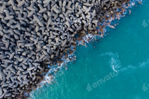 Preview: Top down view of the wave breaker over the sea