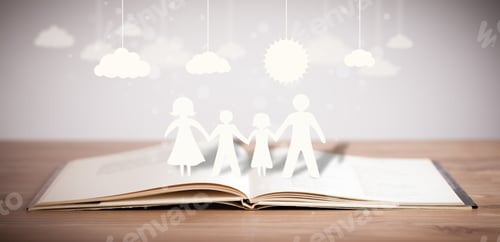 Preview: Cardboard Figures Of The Family On Opened Book. The Symbol Of Unity And Happiness