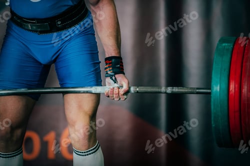 Preview: Closeup of powerlifter and barbell