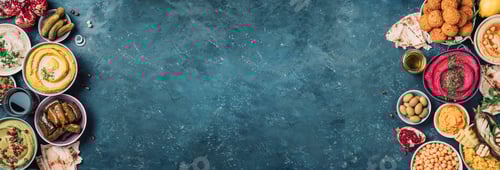 Preview: Arabic traditional cuisine. Middle Eastern meze with pita, olives, colorful hummus, falafel, stuffed