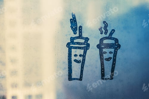 Preview: two sketch doodling cup of drink with smile faces on foggy glass window