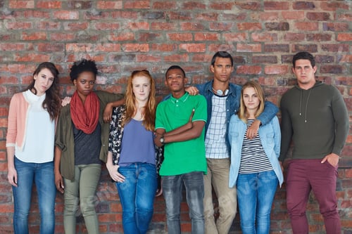 Preview: Portrait of a group of university students standing in their university building