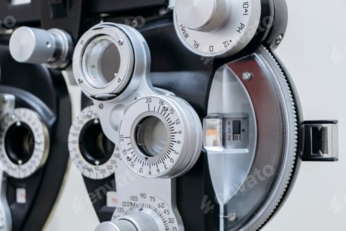 Preview: close up of phoropter used in ophthalmology and optometrist office for eye examinations for glasses