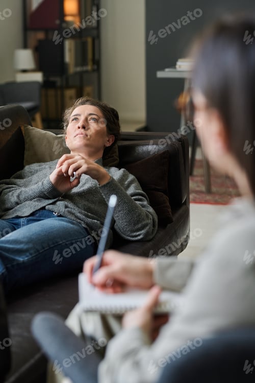Preview: Young Woman Lying On Sofa During Therapy Session
