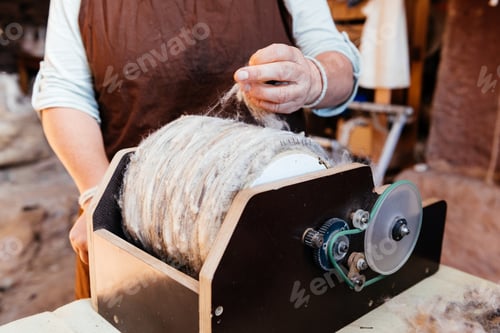 Preview: Crop worker working using wool spinning wheel machine