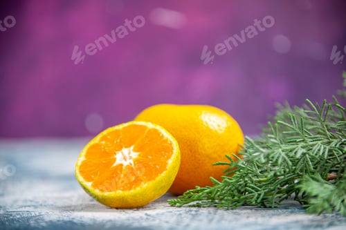 Preview: front view fresh tangerine on light-blue background citrus juice photo fruit color