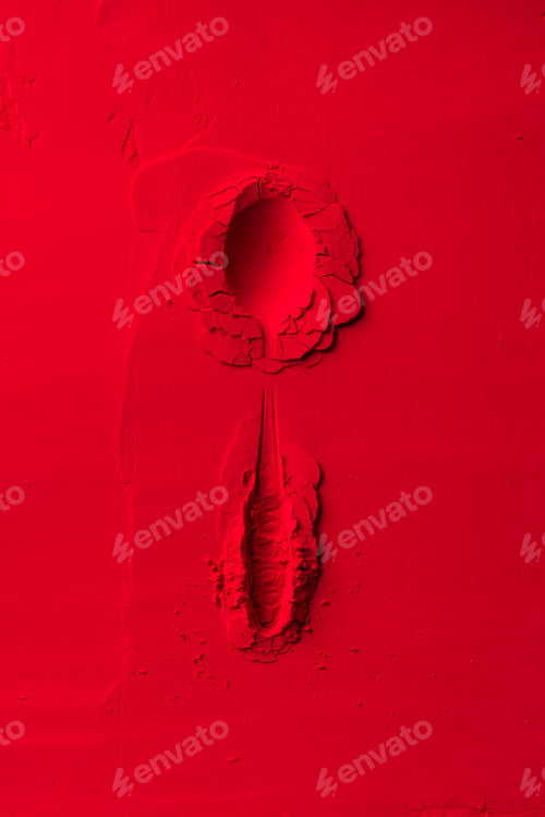 Preview: top view of shape of spoon on red powder