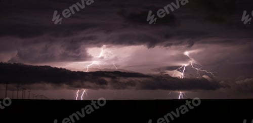 Preview: Lightning striking during a nighttime storm.