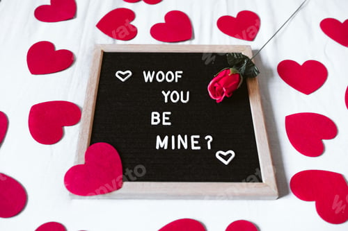 Preview: bed at home by letter board Woof you be mine. Red hearts and rose..Valentines concept