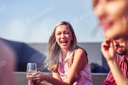 Preview: Emotional young woman drinking wine