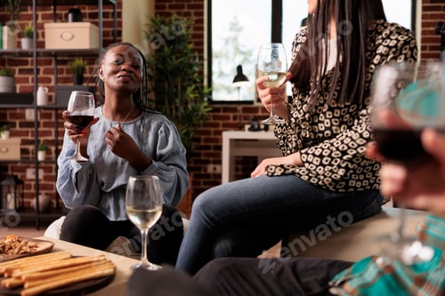 Preview: African american young adult woman laughing