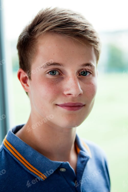 Preview: Close up portrait of teenage schoolboy