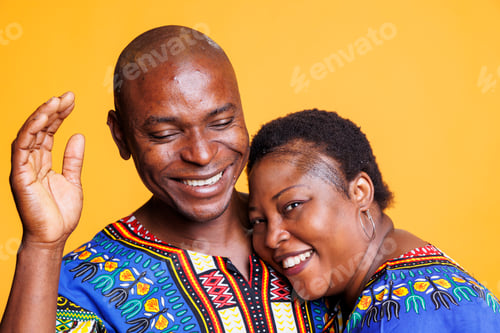 Preview: Happy couple laughing and hugging
