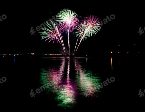 Preview: Fireworks Display Over Water at Night