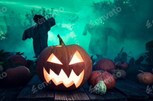 Preview: Glowing Halloween pumpkin with green mist and scarecrows