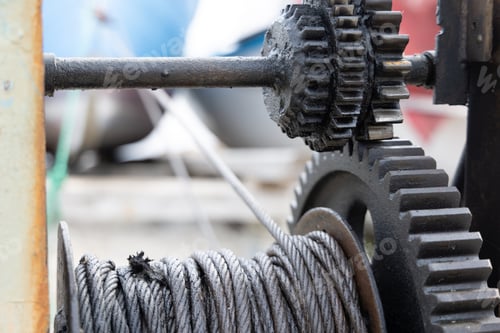 Preview: Winch with a rope on a pier with boats and boats against the sky