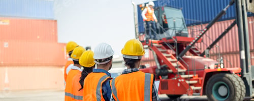 Preview: Foreman control loading Containers ship for Logistic planning and explain work to team of diversity