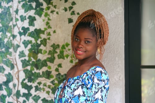 Preview: Portrait of attractive black skin young woman, Charming Afro girl. Portrait of afro girl looking at