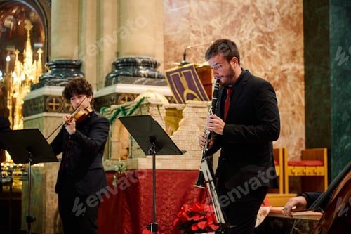 Preview: Evening concert with instrumentalists in a church setting