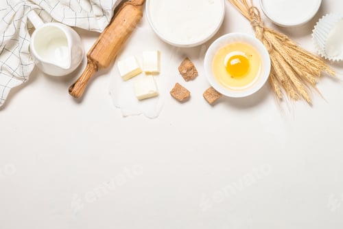 Preview: Baking ingredients at blue table top view.