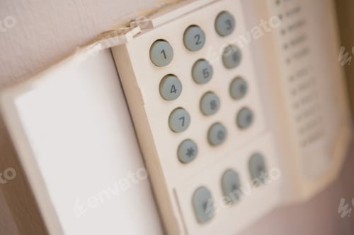 Preview: Close up of home security keypad on the wall