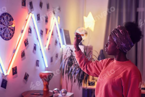 Preview: Woman playing darts at party