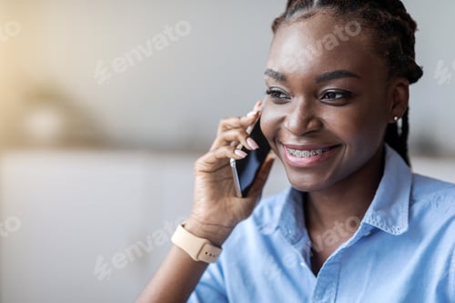 Preview: Phone Call. Smiling African American Woman With Braces Talking On Cellphone