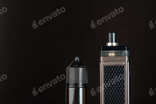 Preview: Vape and vape liquid bottles against black background