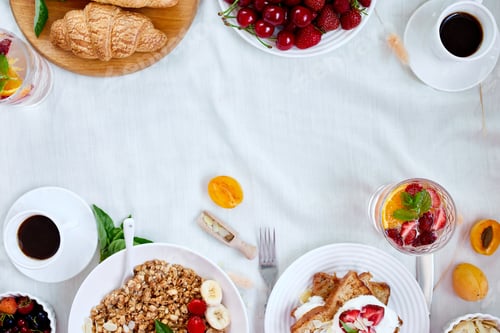 Preview: Fresh and bright continental breakfast table, abundance healthy meal variety