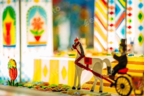 Preview: Handmade caramel horse and wagon in showcase