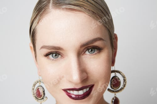 Preview: Portrait Beauty women with big blue eyes and dark eyebrows looking at camera.