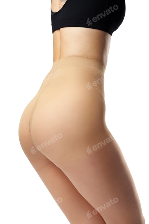 Preview: Legs of slim woman in tights on white background