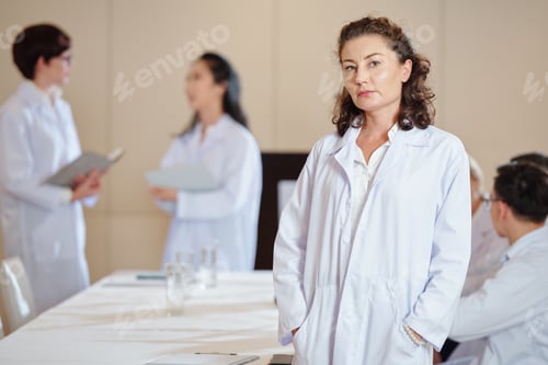 Preview: Mature pharmacologist in boardroom