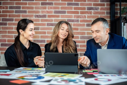 Preview: Business session in an office. Women and a man discussing business affairs
