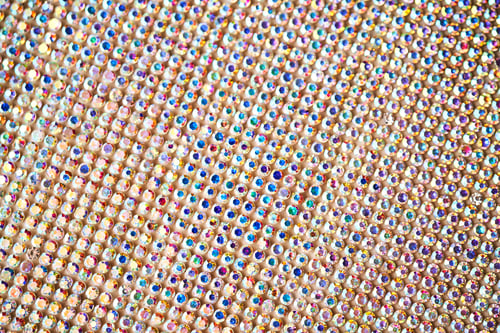 Preview: Abstract background made of rhinestones shimmering in the light.