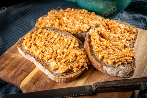 Preview: Slices of bread with egg and sprat paste in tomatoes