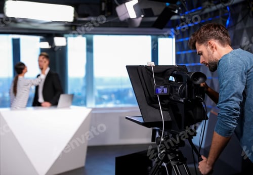 Preview: Professional video camera operator working in studio. News broadcasting